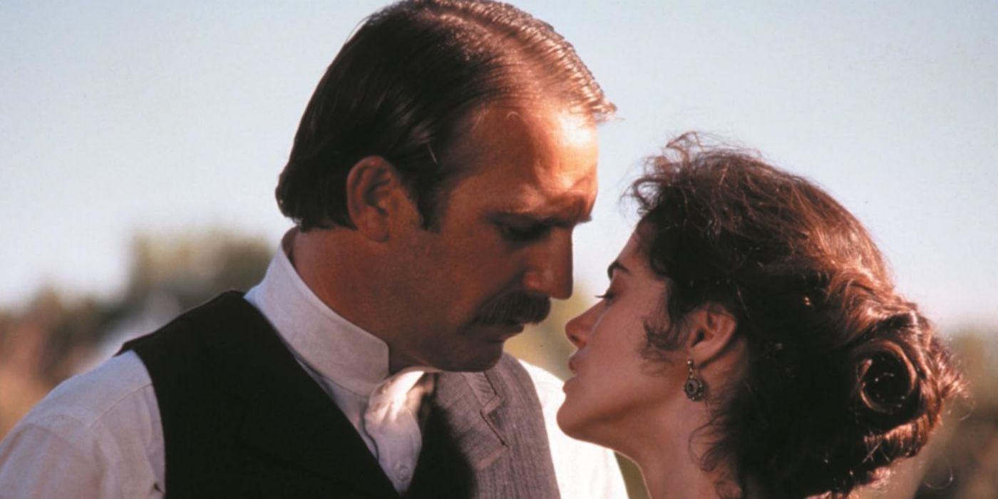 Kevin Costner and Joanna Going About to Kiss in Wyatt Earp