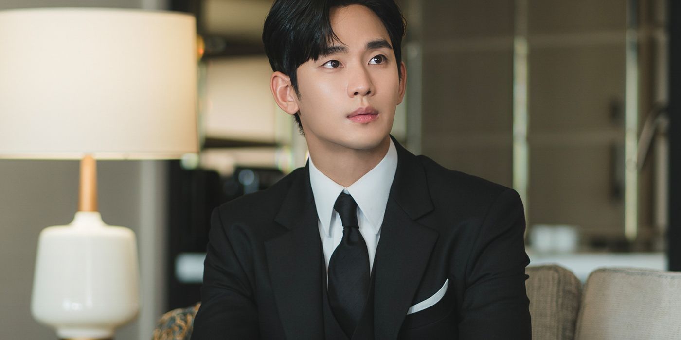 Kim Soo Hyun in a suit sitting in Queen of Tears
