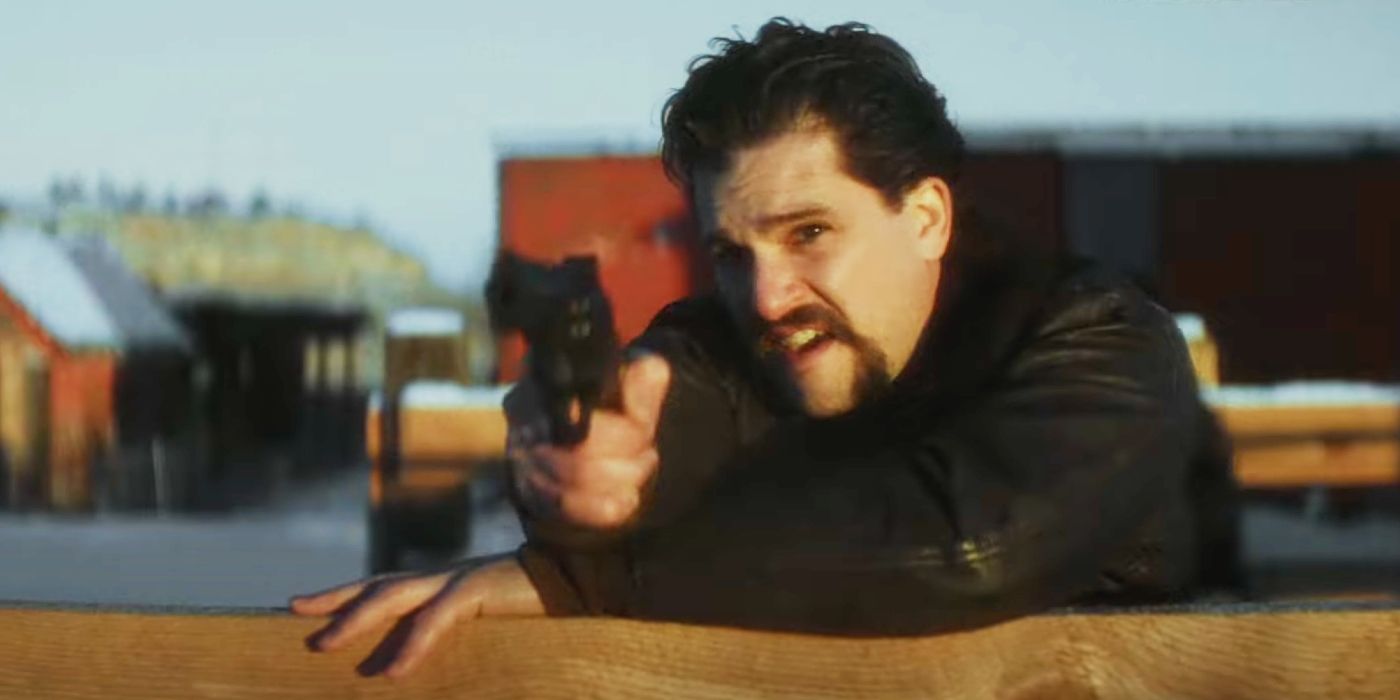 Kit Harington points a gun in Blood for Dust