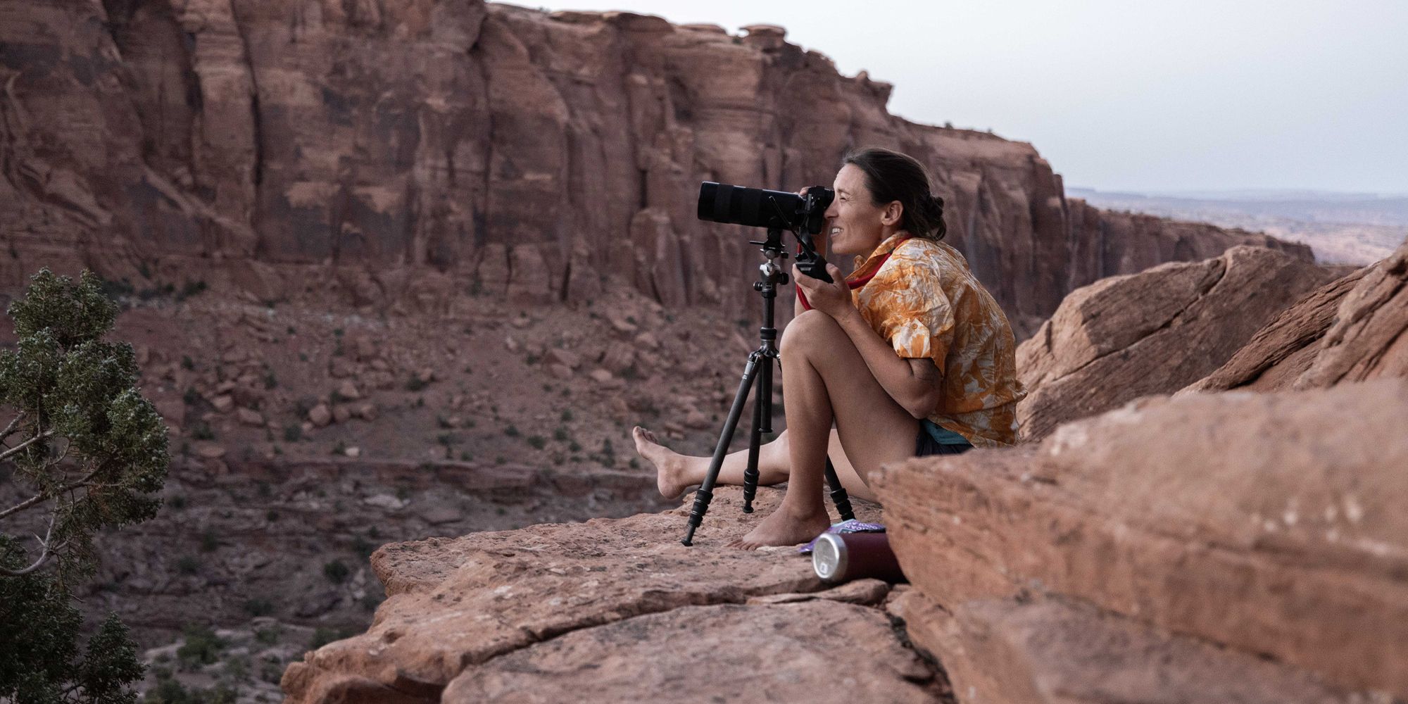 Krystle Wright taking a picture in National Geographic Photographer