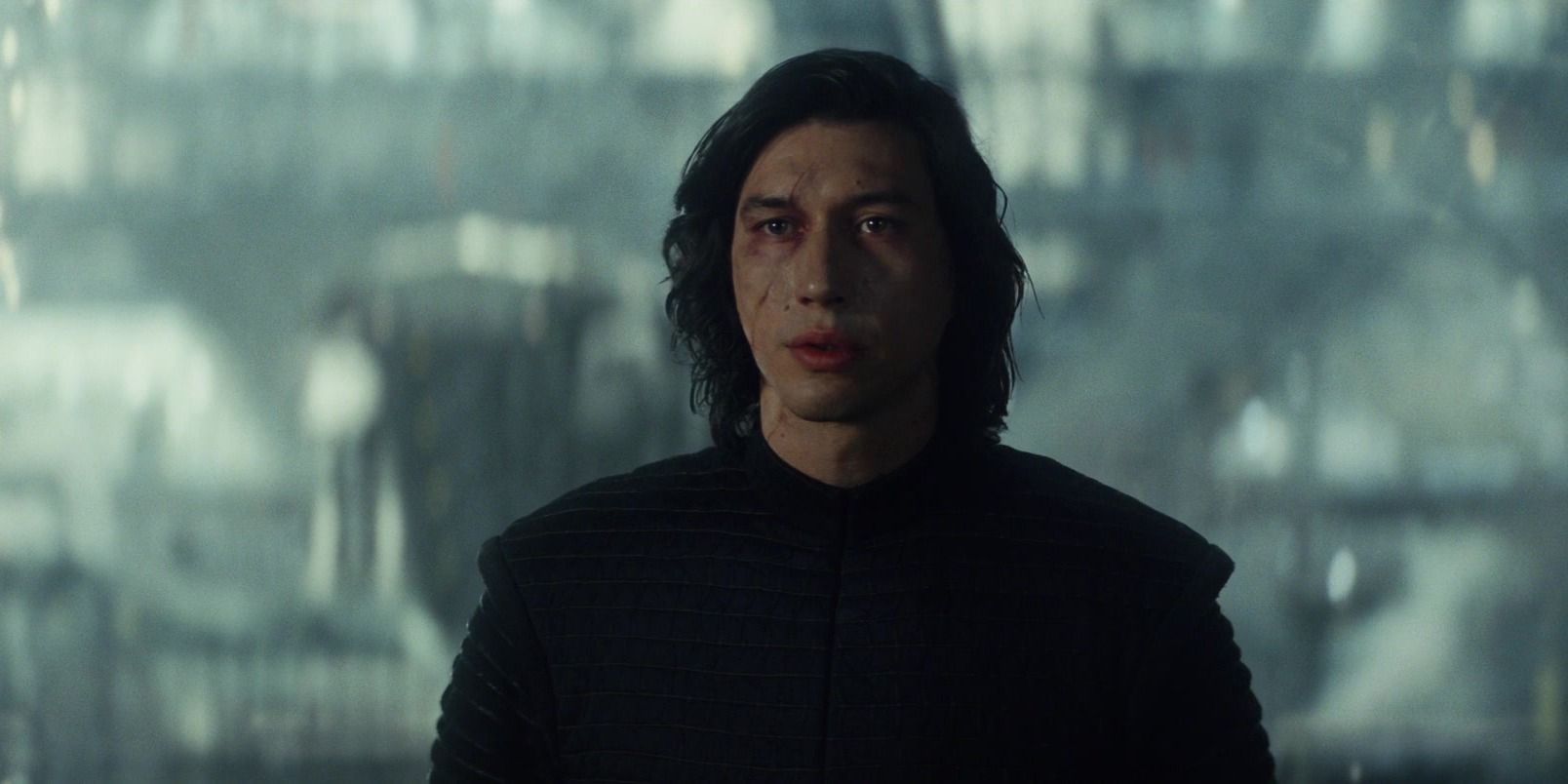 Kylo Ren with visible injuries looking upset in The Last Jedi
