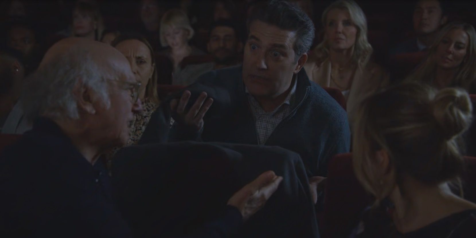Larry has an argument in a theater in Curb Your Enthusiasm
