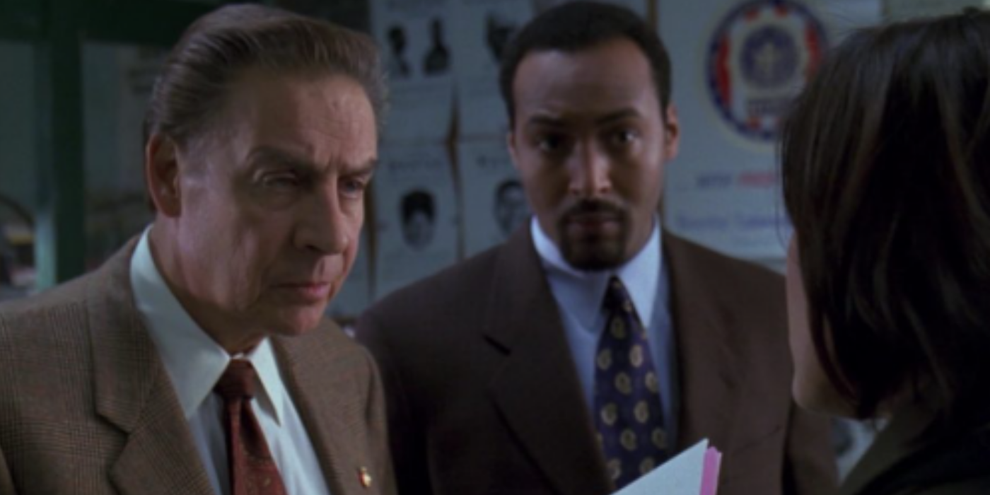 Jerry Orbach and Jesse L. Martin look serious in the Law and Order SVU Season 1, Episode 15, episode Entitled