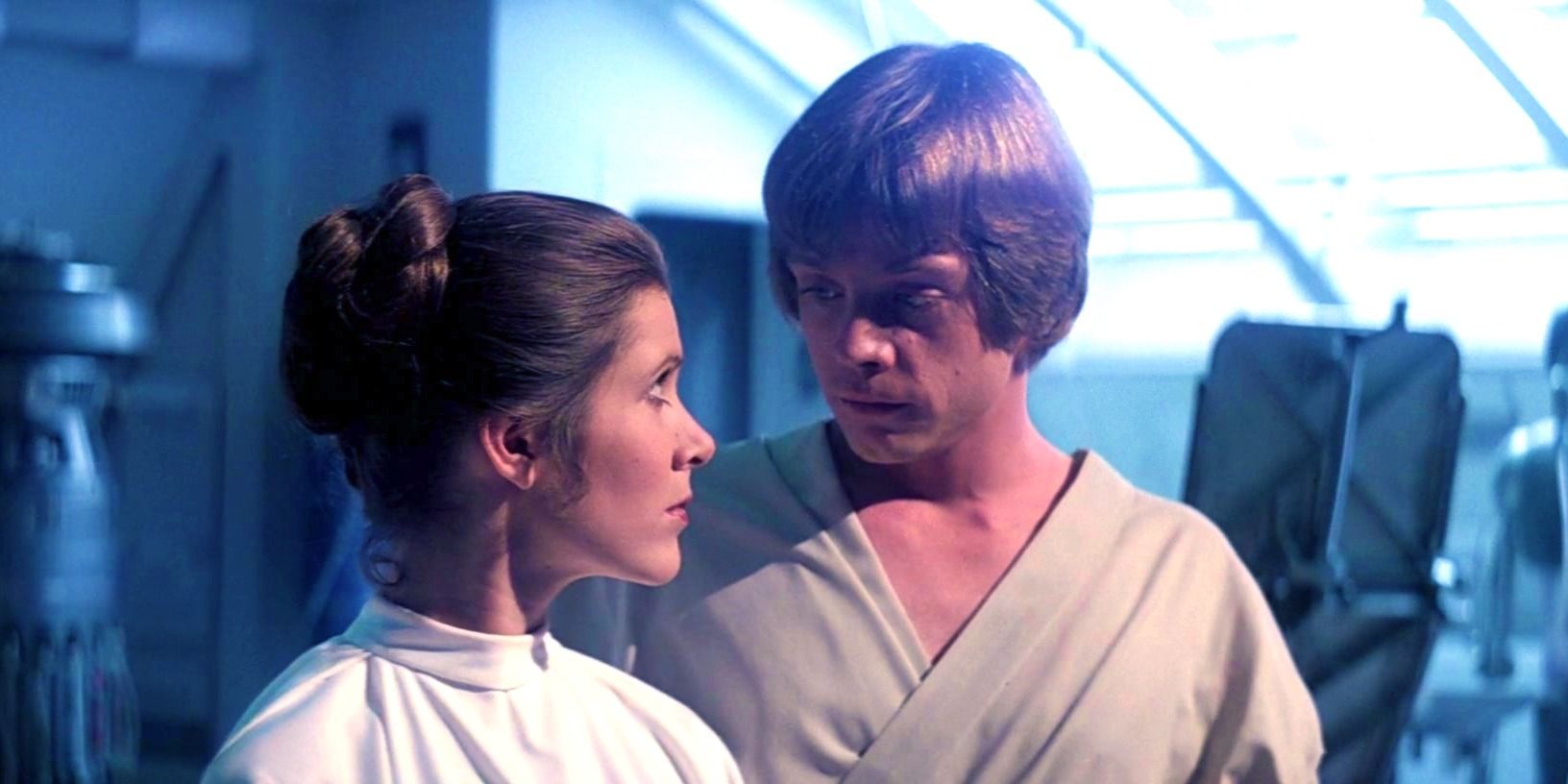 Luke Skywalker and Princess Leia looking at one another in The Empire Strikes Back
