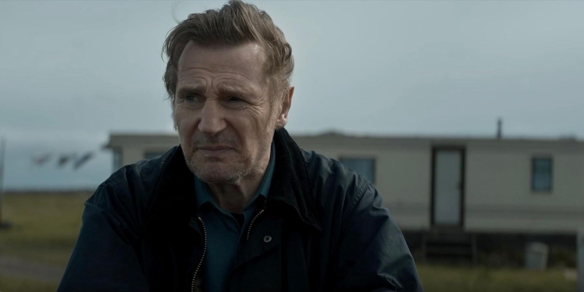 Liam Neeson stares into the distance in In the Land of Saints and Sinners-2