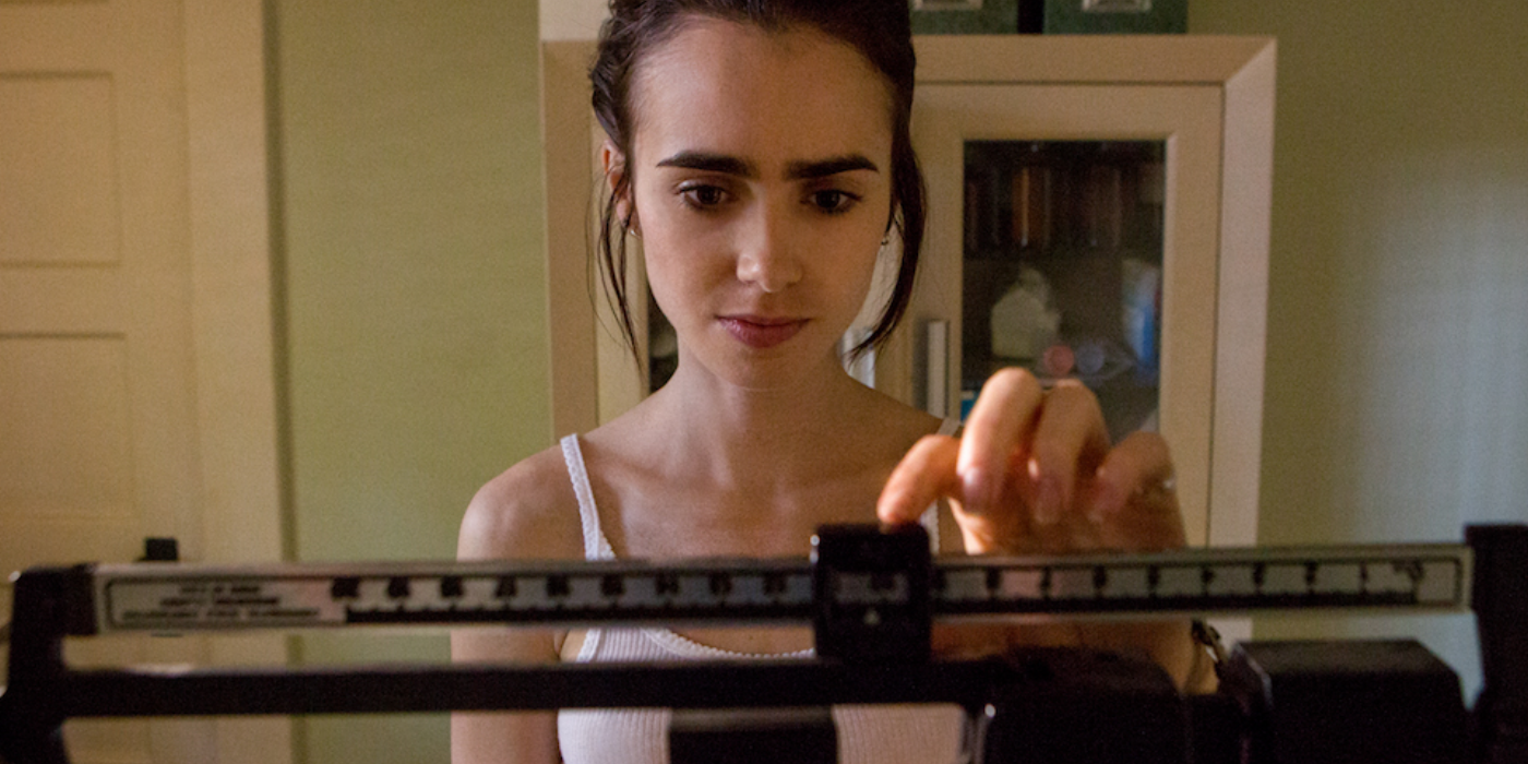 Lily Collins as Ellen on the scale in To The Bone