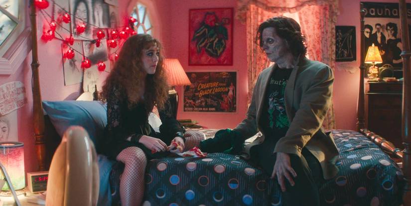 Lisa and The Creature sitting on her bed in Lisa Frankenstein