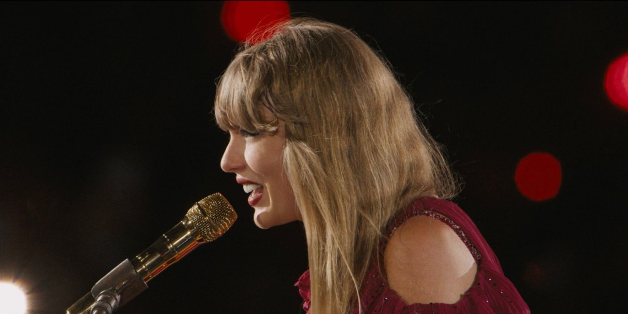 Taylor Swift performs "Maroon" in The Eras Tour movie.