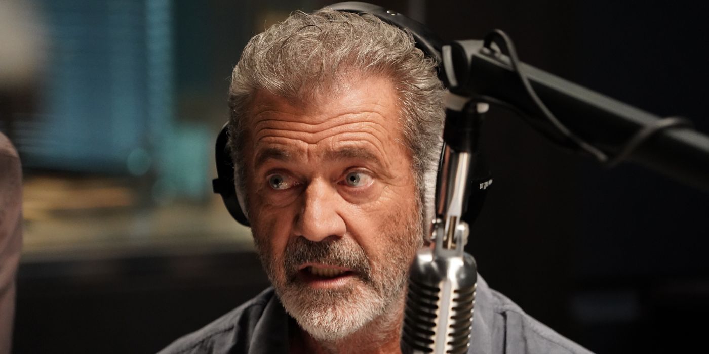 Mel Gibson speaks on the mic in On The Line.