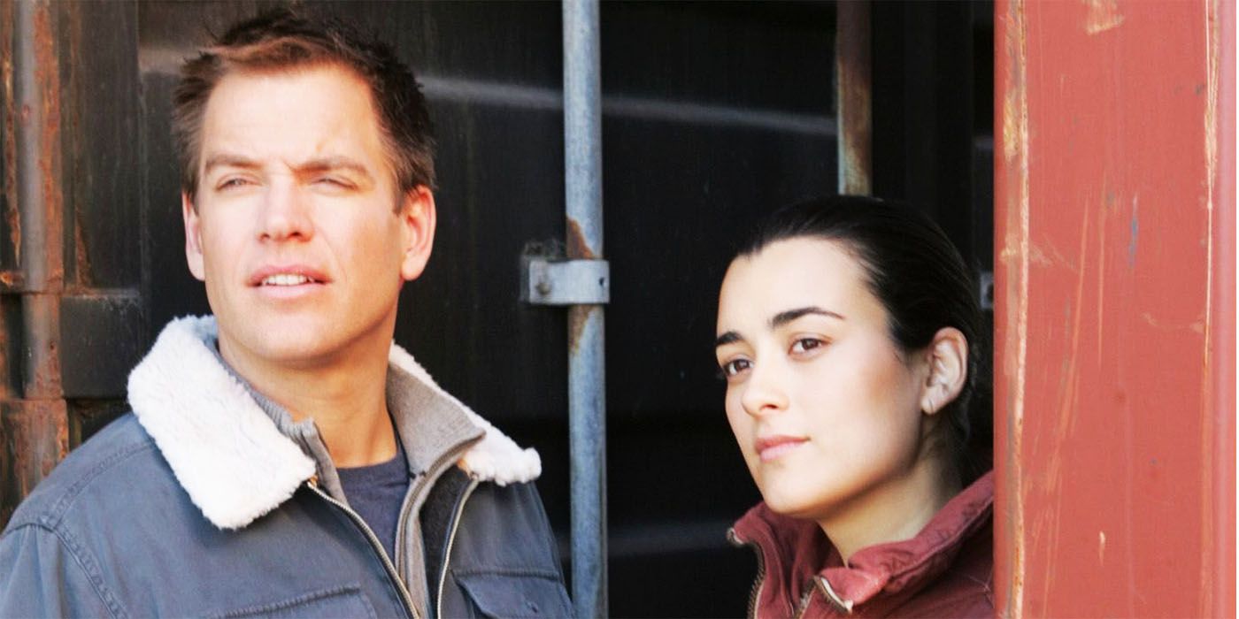 Michael Weathery and Cote de Pablo standing next to each other as Tony and Ziva on NCIS