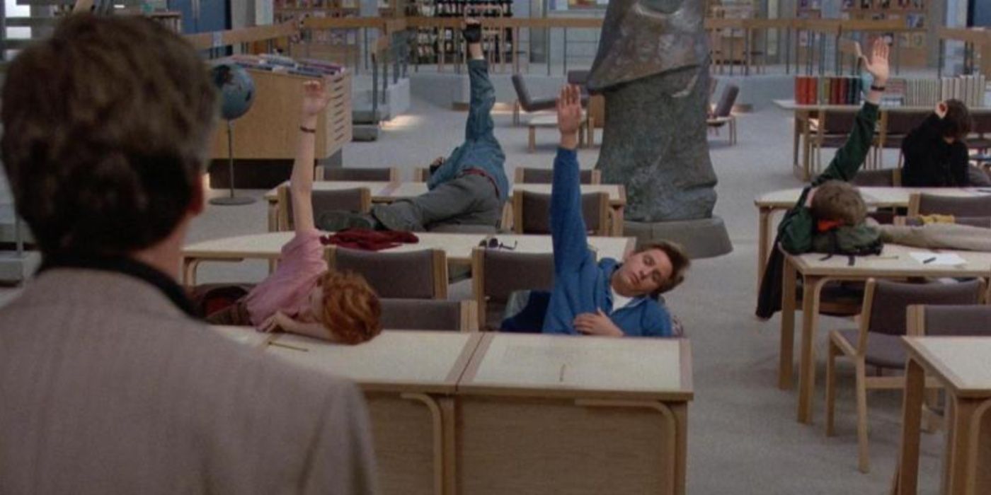 The cast of The BReakfast Club tired in the library