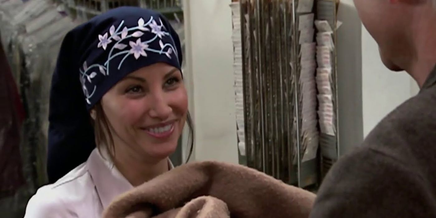 Anna smiles at Larry in Curb Your Enthusiasm