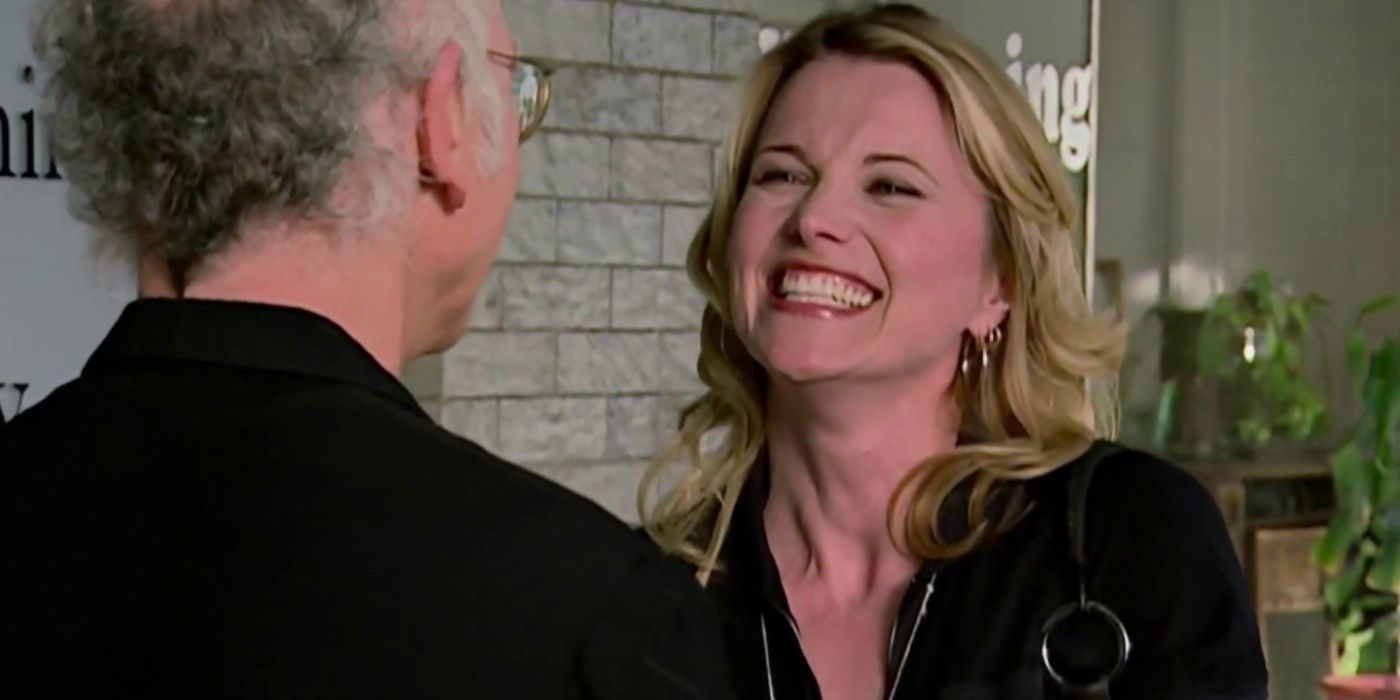Lucy Lawless grins at Larry in Curb Your Enthusiasm