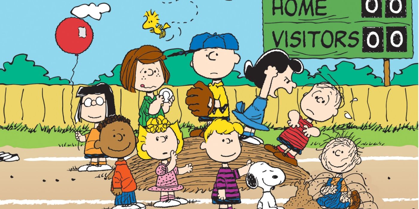 The Peanuts gang assembled around Charlie Brown on the mound of the baseball field