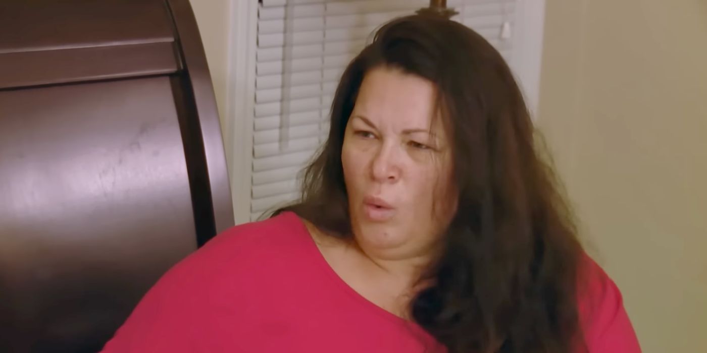 Molly Hopkins 90 Day Fiancé in red top and messy hair looking shocked