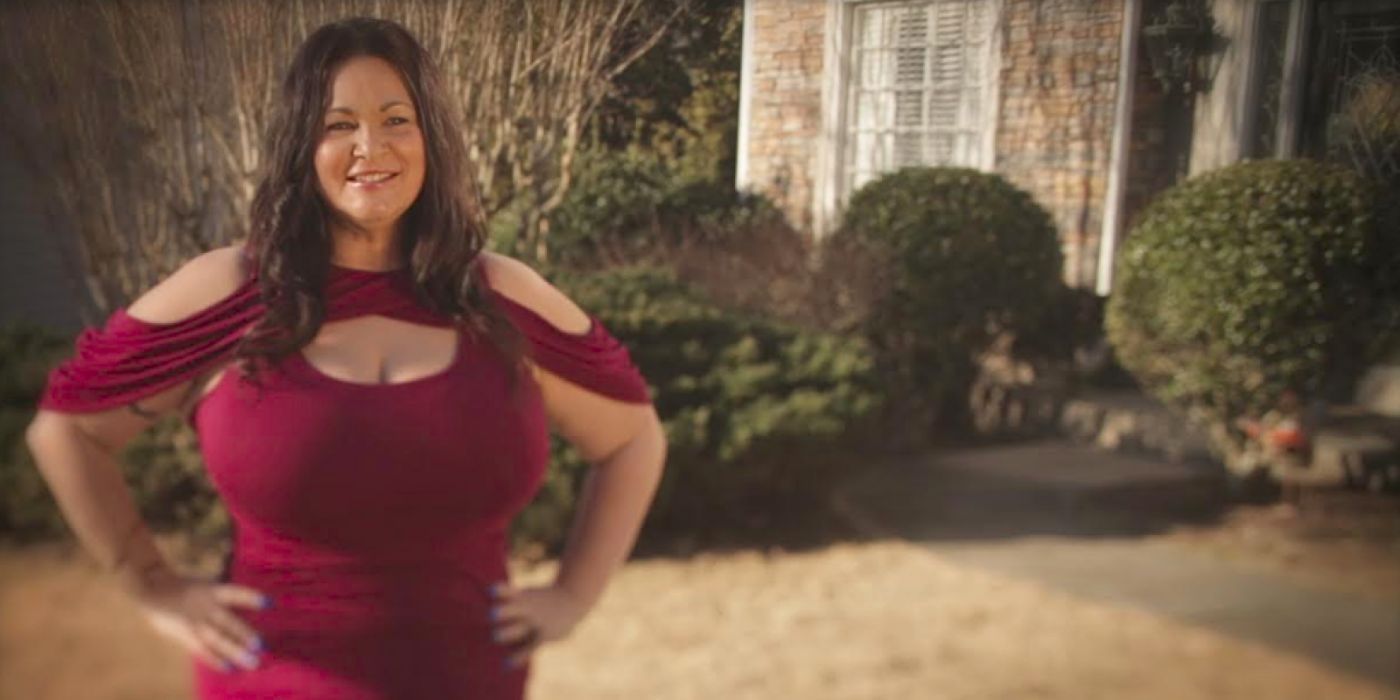 Molly Hopkins 90 Day Fiancé posing in red cutout dress in promo photo