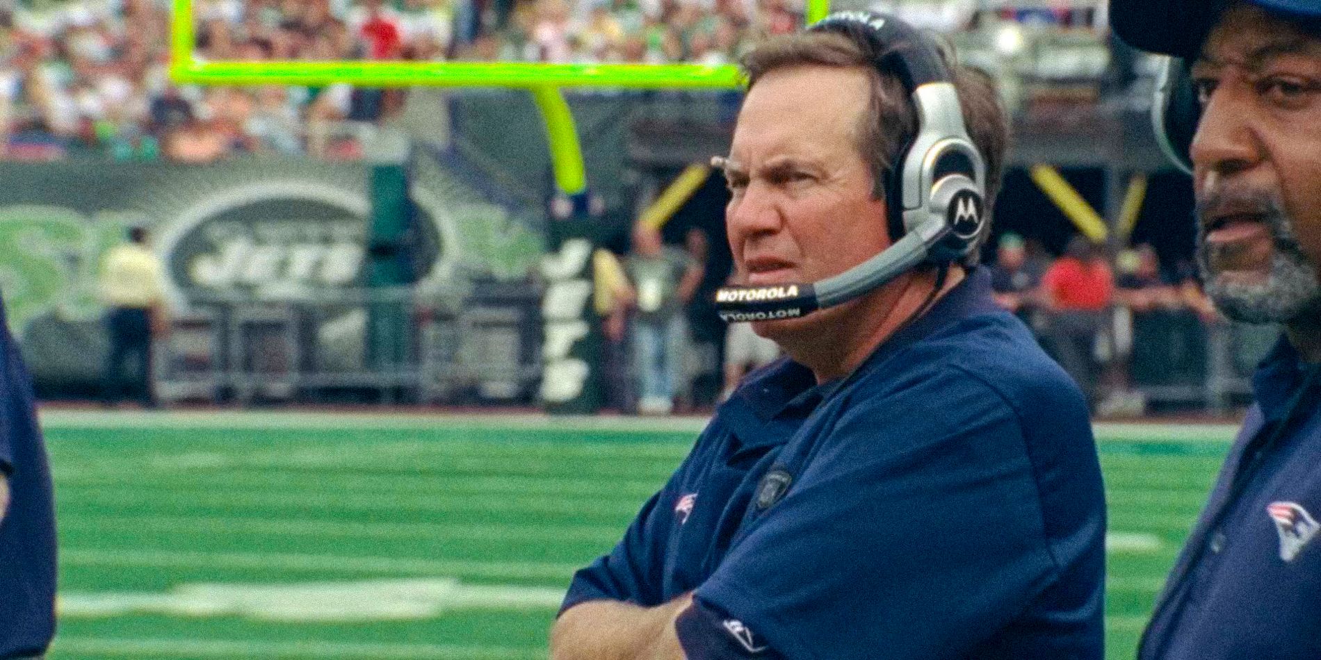 Bill Belichick looks uncomfortable on The Dynasty England Patriots field