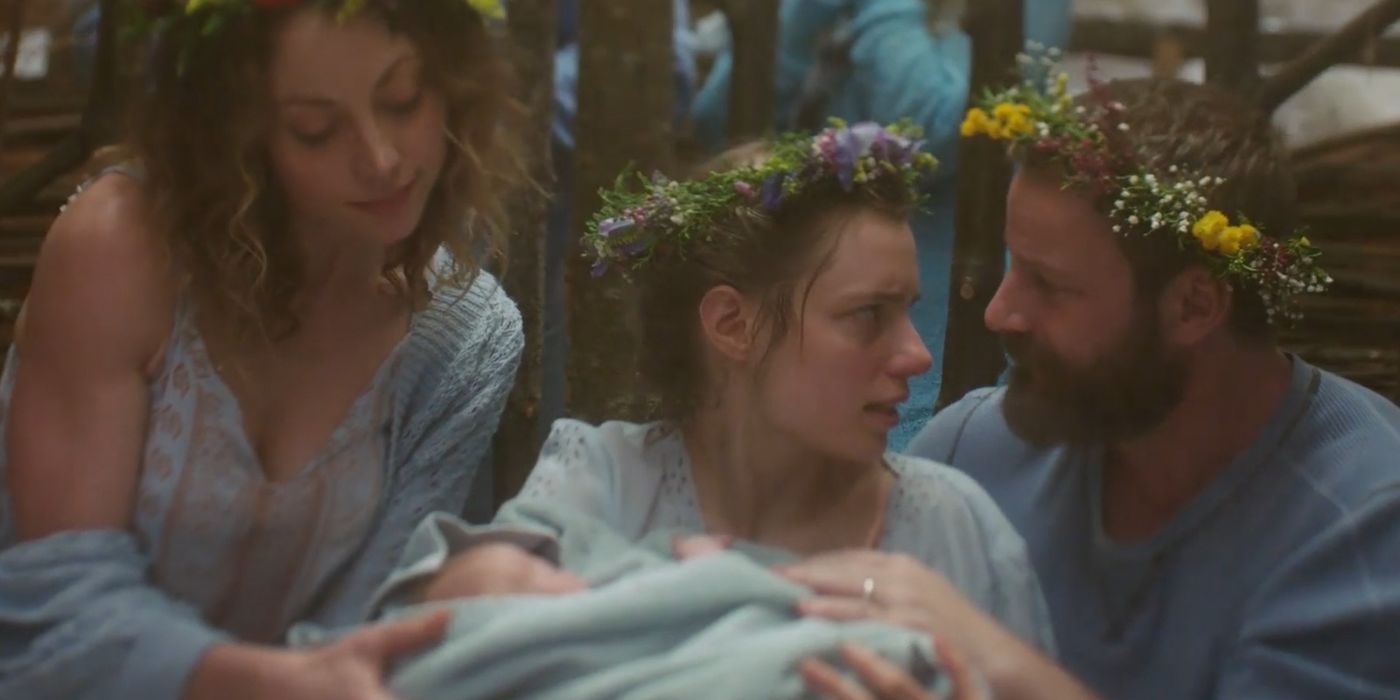 Olivia Bly (Anja Savcic) after giving birth to her baby surrounded by cult members in Sacred Lies.