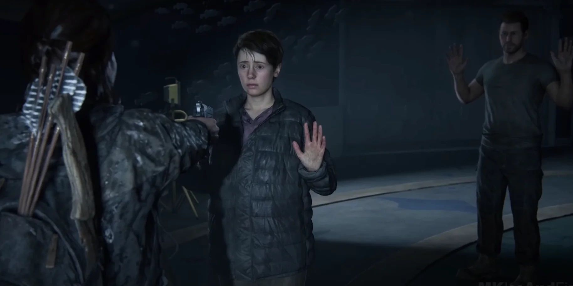 Owen and Mel with their hands up in The Last of Us Part II