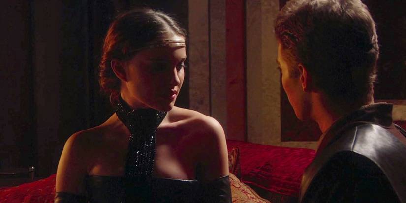 Padme in her black corset dress in Attack of the Clones looking at Anakin