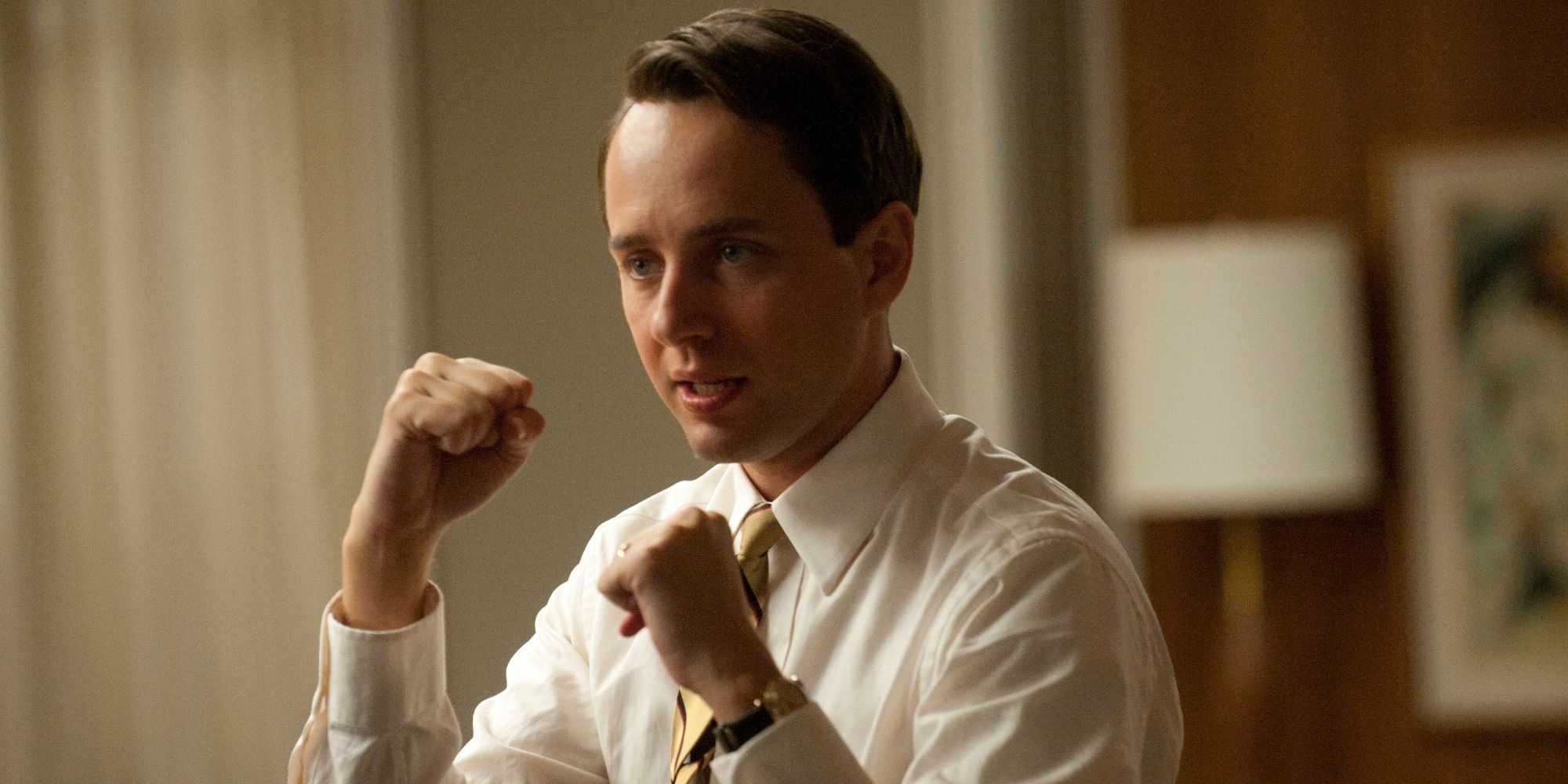 Pete Campbell with his fists up in Mad Men