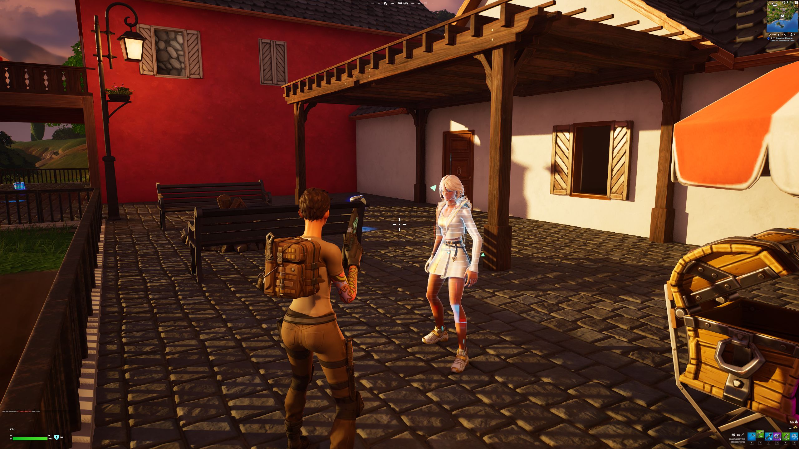 Jogador conversando com o NPC de Afrodite na varanda de pedra ao pôr do sol em Fortnite Capítulo 5, temporada 2