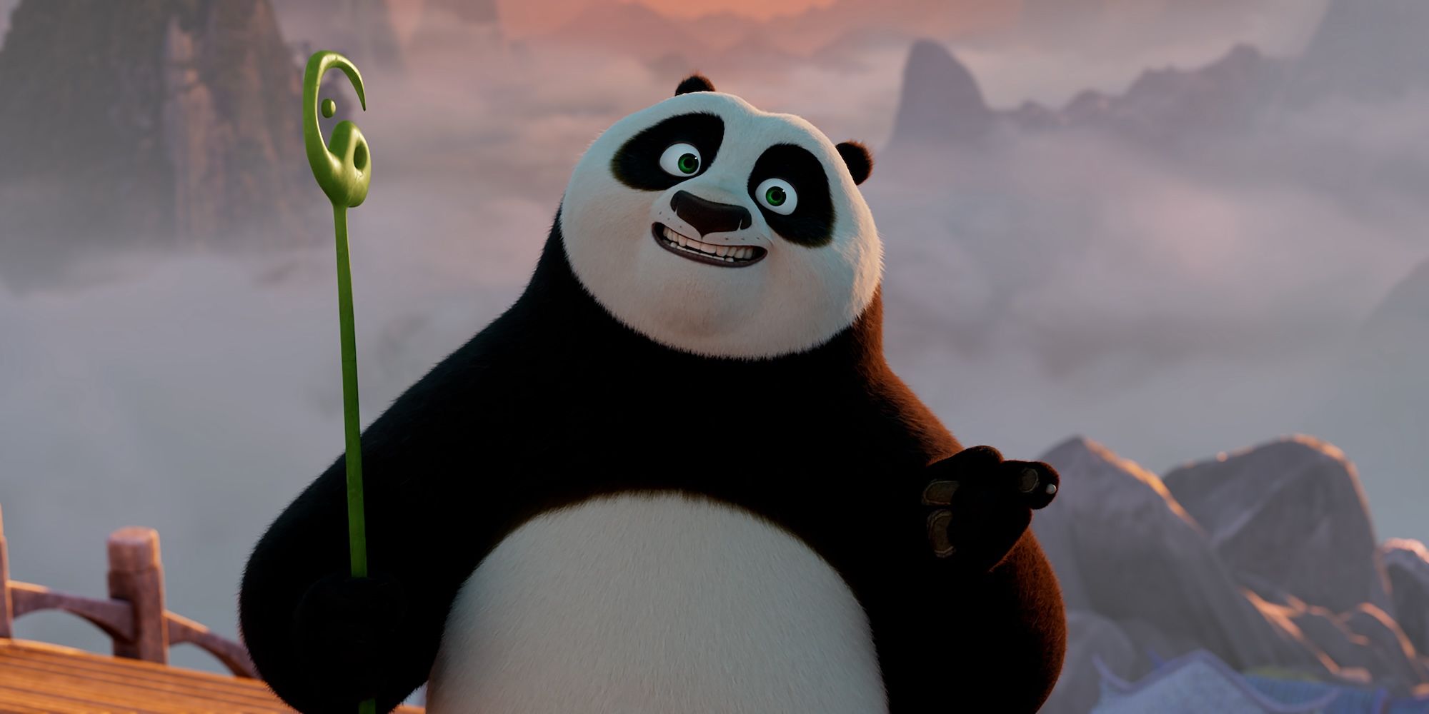 Po looking flustered while holding the staff of knowledge in Kung Fu Panda 4