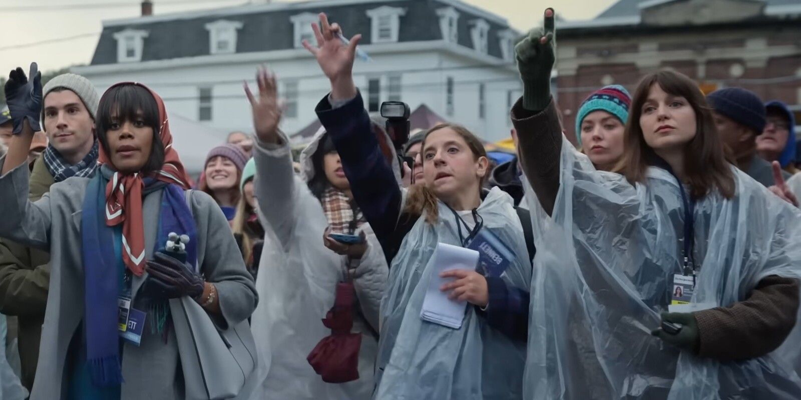 Kimberlyn & Sadie Hands Raised In The Rain For Questions In The Girls On The Bus.jpg