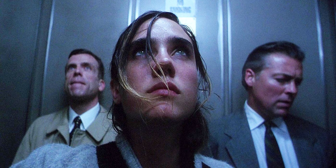 Marion (Jennifer Connelly) in an elevator with two men in Requiem for a Dream.