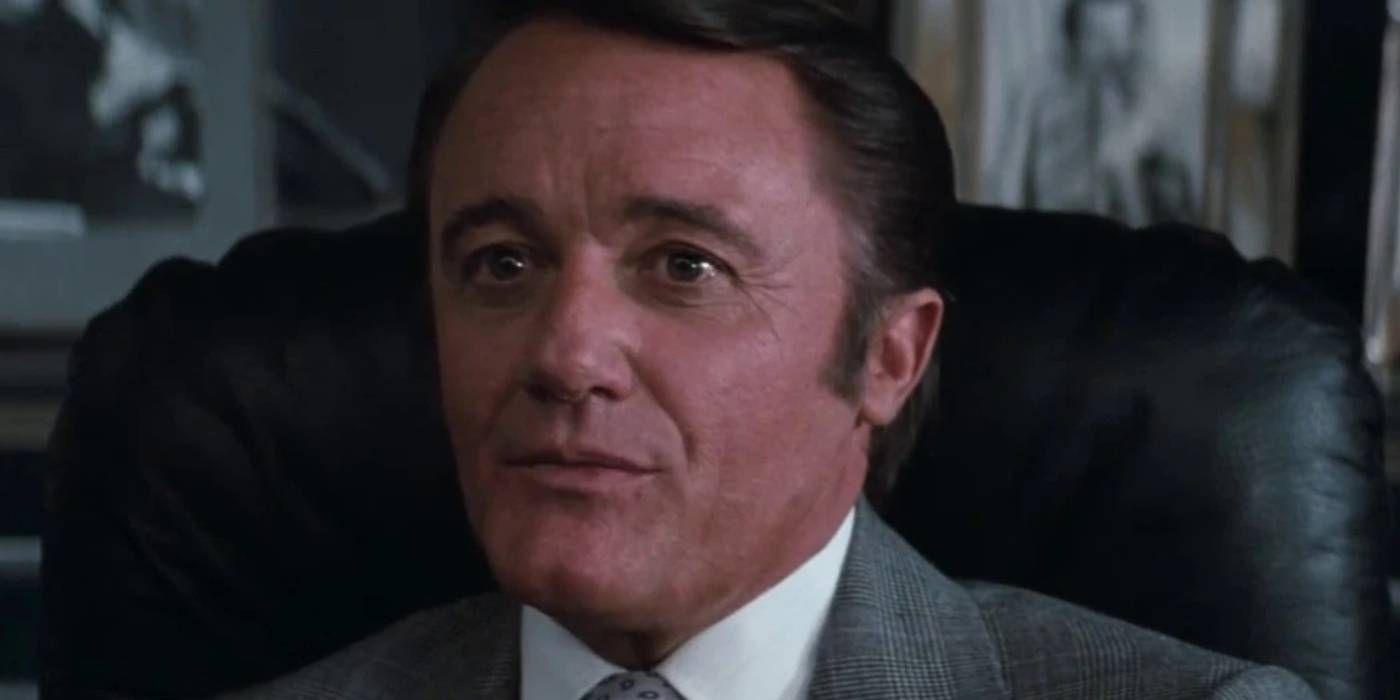 Richard Vaughn as Ross Webster in a business suit Superman III (1983)