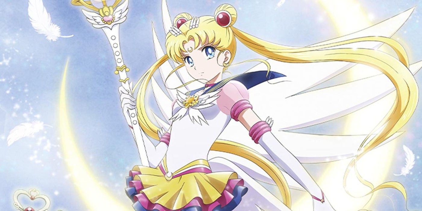 Eternal Sailor Moon stands with her smaller wings, holding the Eternal Tiare