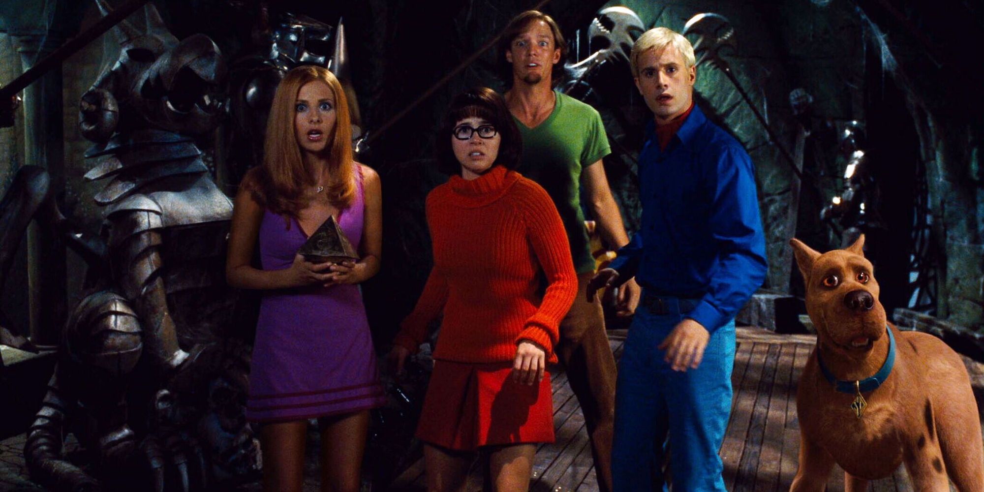 Matthew Lillard as Shaggy, Sarah Michelle Gellar as Daphne, Linda Cardellini as Velma, and Freddie Prinze Jr. as Fred in Scooby-Doo (2002).