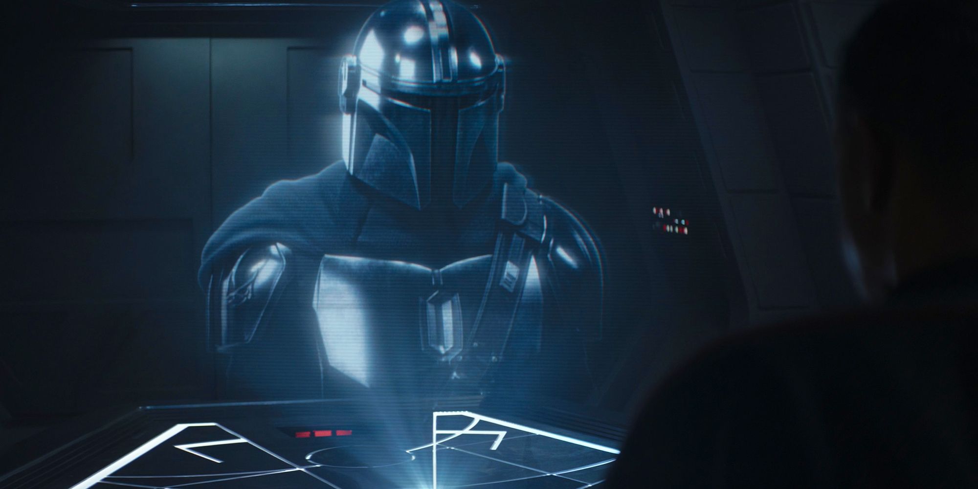 Din Djarin appears in a holographic message to Moff Gideon on the bridge of his lightcruiser in The Mandalorian