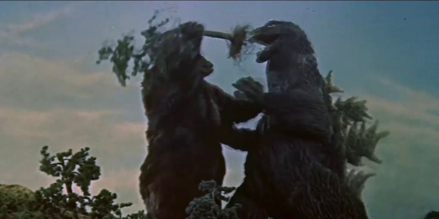 King Kong forces a tree down Godzilla's throat to stop his atomic breath