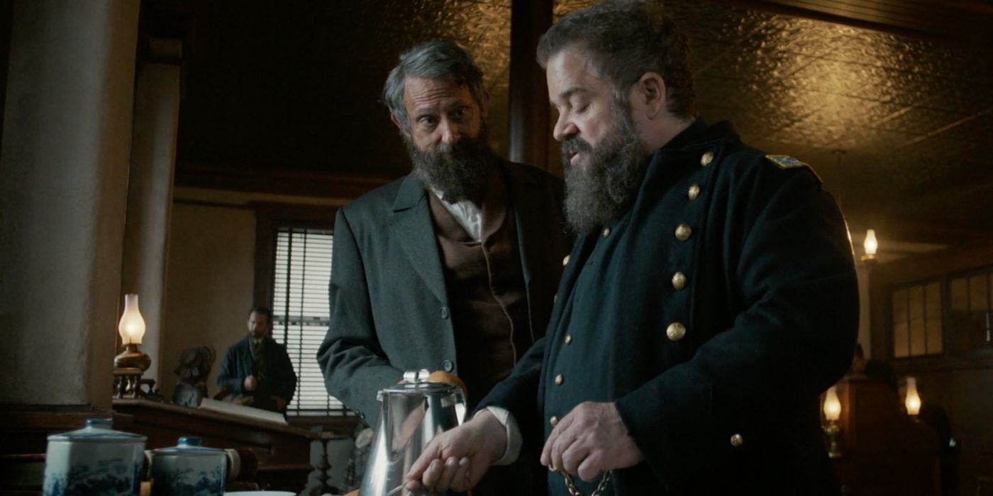 Patton Oswalt consults with his cousin as Lafayette Baker in Manhunt