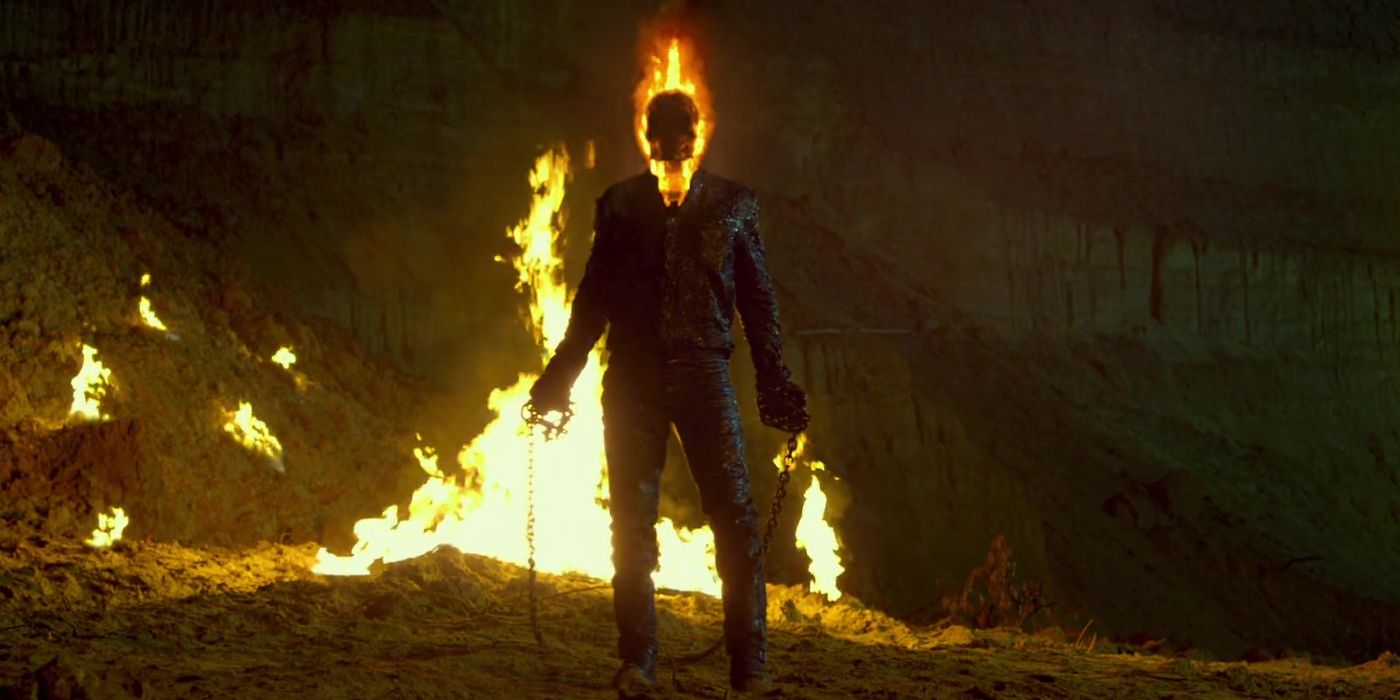 Nicolas Cage as Ghost Rider standing holding a chain in Ghost Rider: Spirit of Vengeance (2011)
