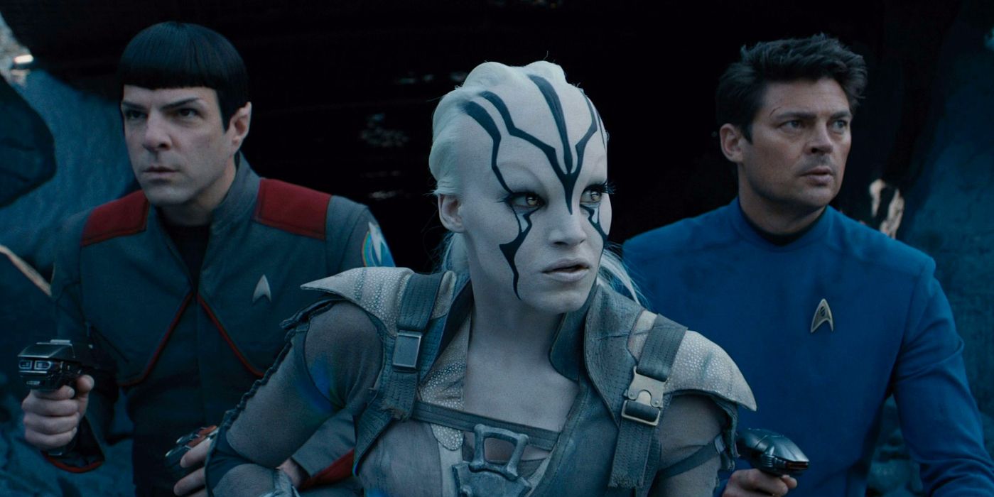 Zachary Quinto as Spock, Sofia Boutella as Jaylah, and Karl Urban as Dr. McCoy ready to fight in Star Trek Beyond