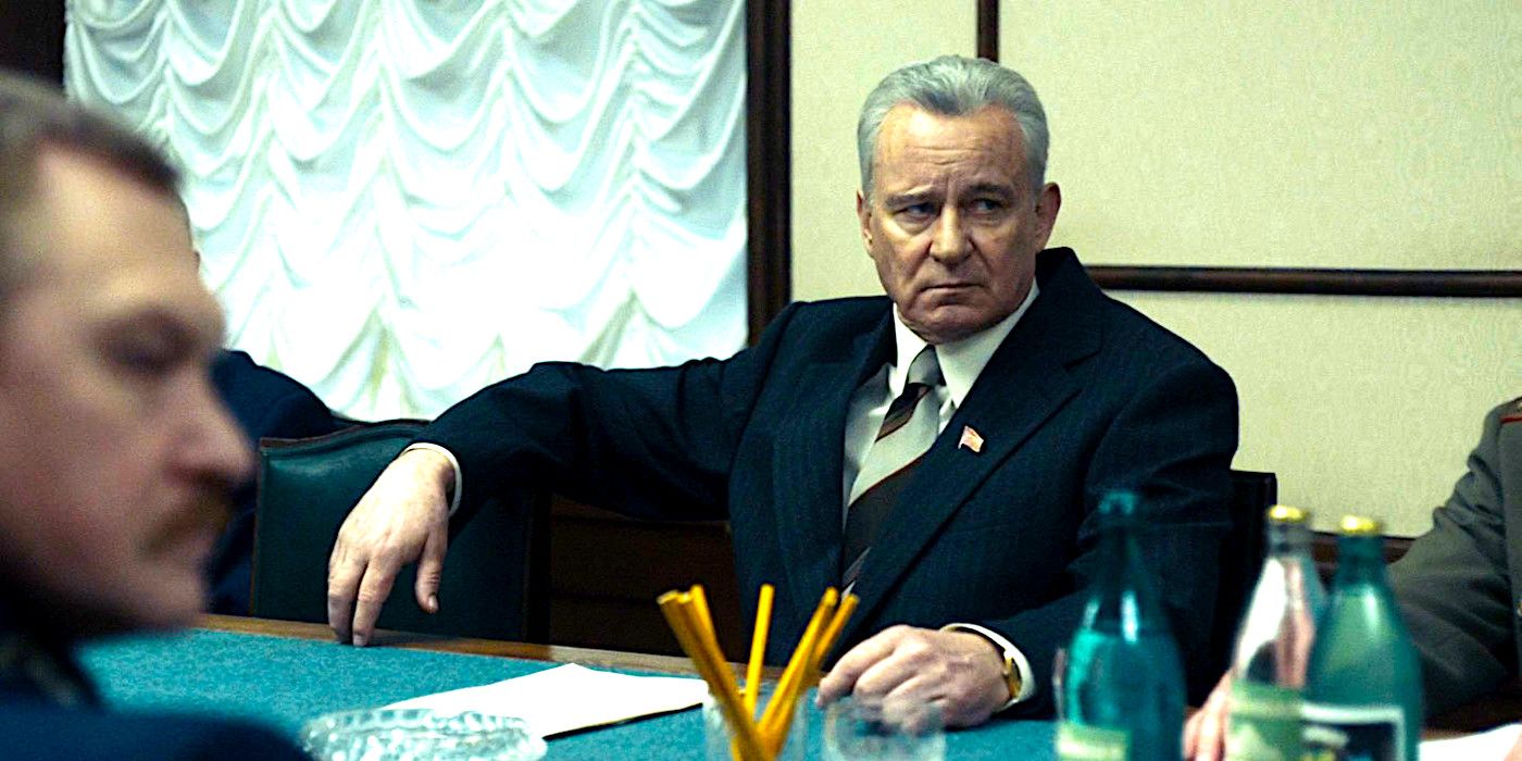 Stellan Skarsgard looks grimly series during an important meeting in a dramatic scene fromChernobyl