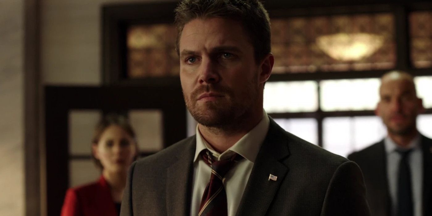 Stephen Amell as Oliver Queen in a suit in Arrow