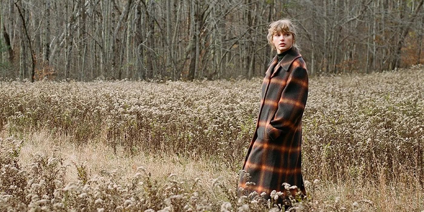 Taylor Swift Evermore photoshoot in a field