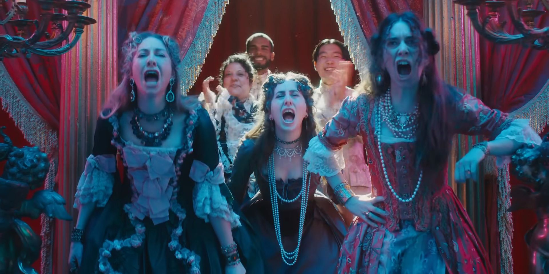 Danielle, Alana, and Este Haim dressed in old-fashioned gowns while screaming in Taylor Swift's 