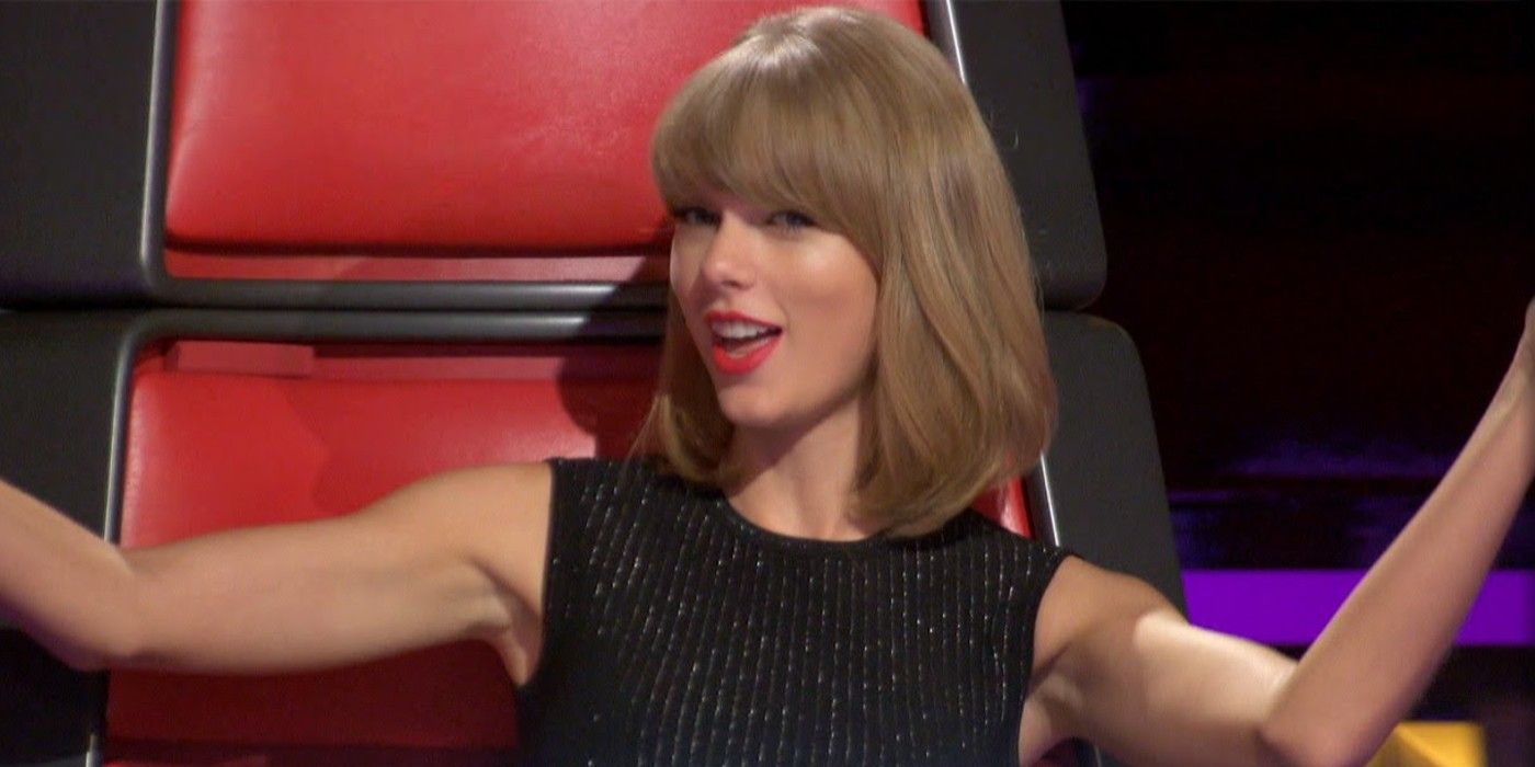 Taylor Swift On The Voice With Arms Raised