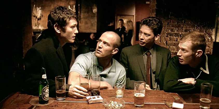 The cast of Lock, Stock and Two Smoking Barrels in a pub.