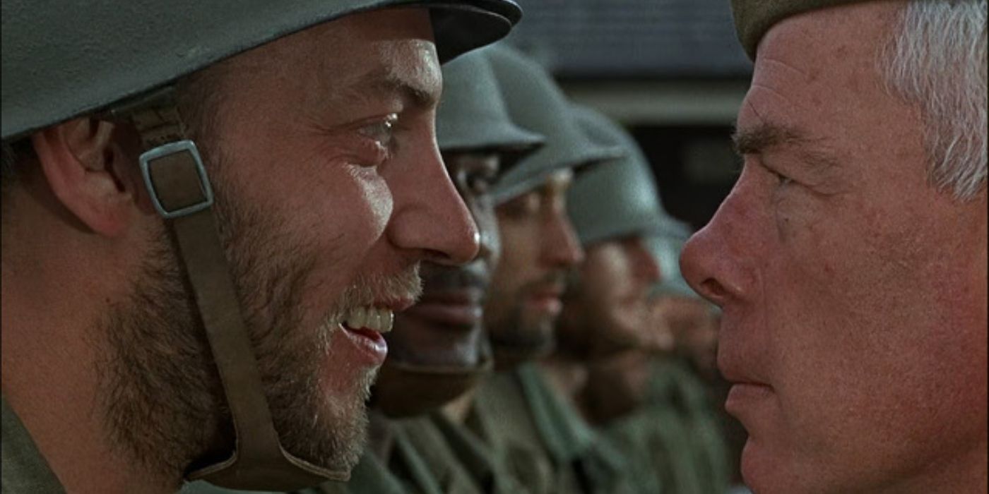Donald Sutherland smiling at Lee Marvin in The Dirty Dozen