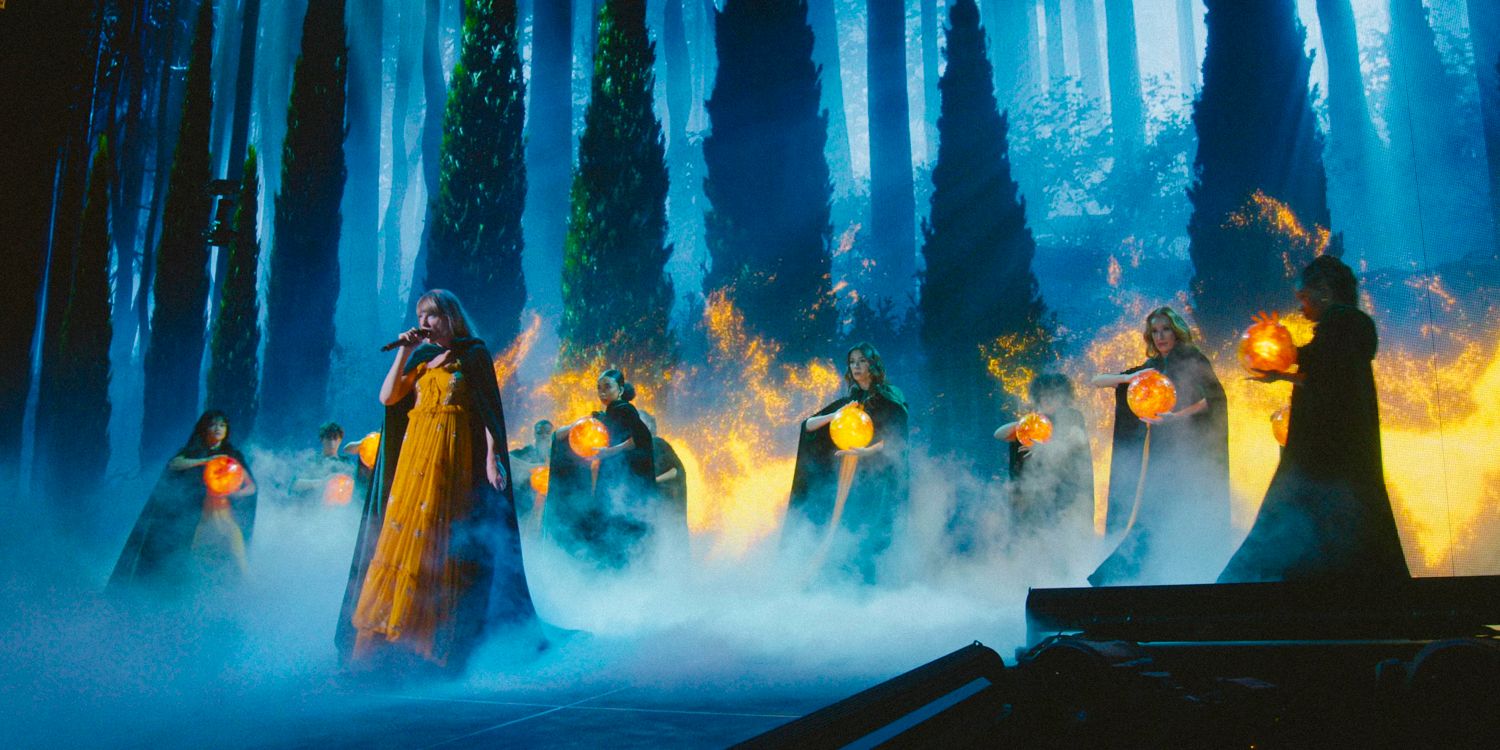 Taylor Swift performing 'Willow' from the Evermore era, Wide shot from the Eras Tour.