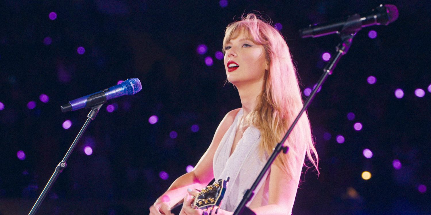 Close-up shot of Taylor Swift playing the guitar from the Eras Tour.