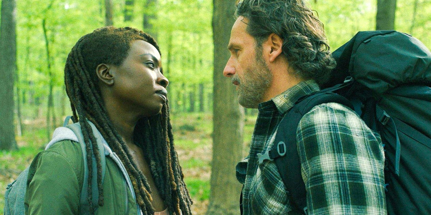 Rick Grimes and Michonne Hawthorne staring at each other intensely with a forest in the background in The Walking Dead: The Ones Who Live