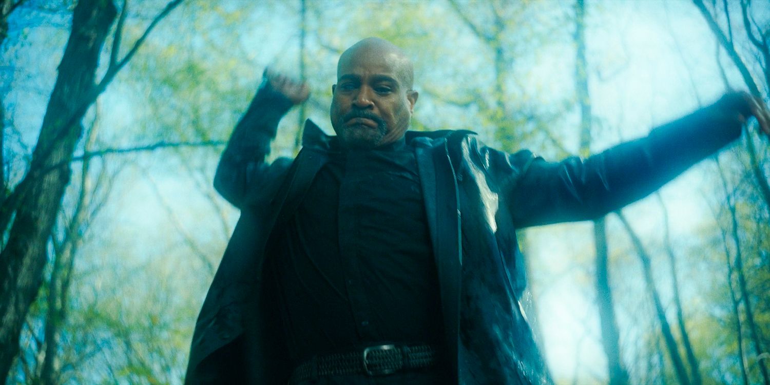 Gabriel Stokes about to strike a walker with a stick in The Walking Dead the Ones Who Live S1 Ep5