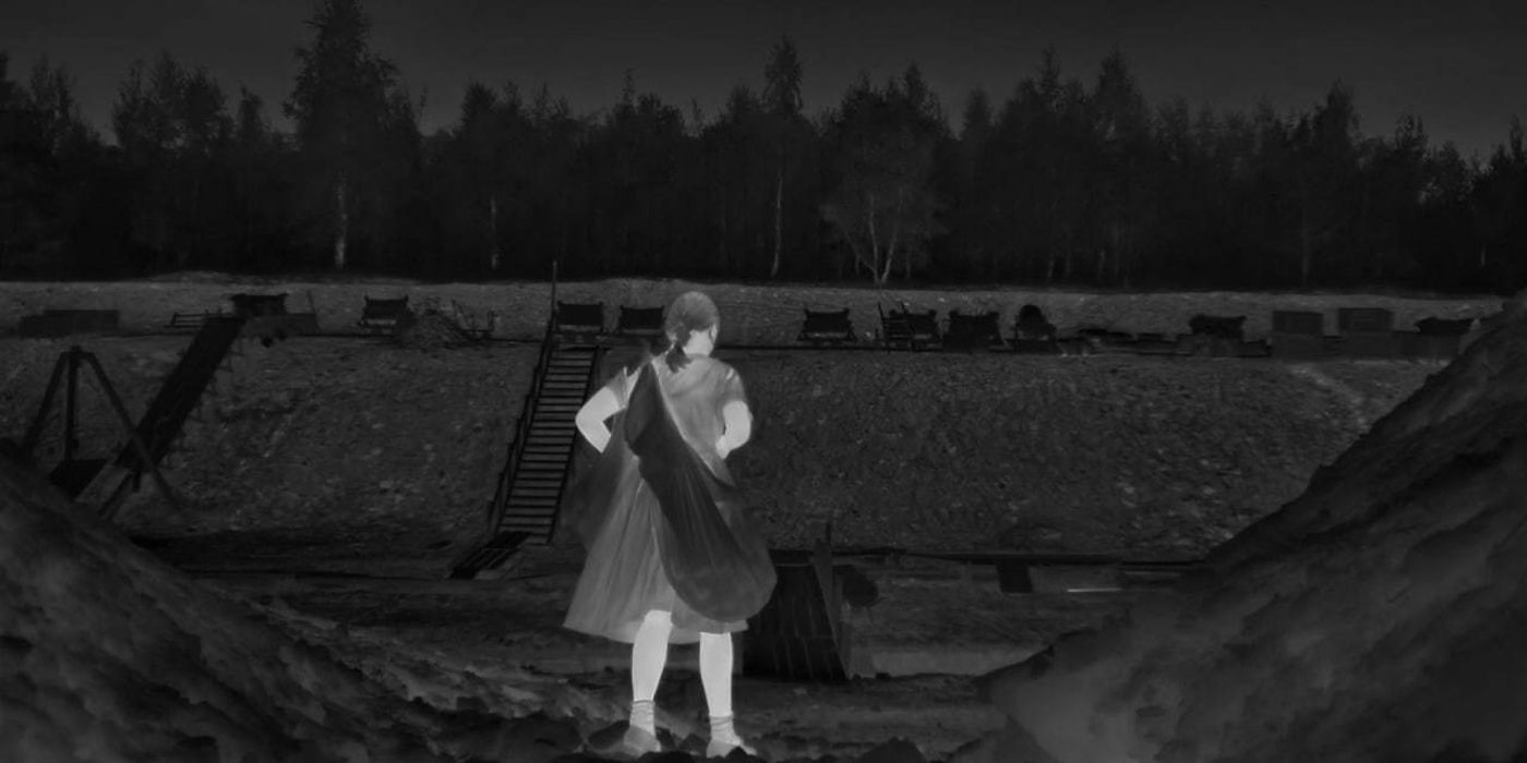 Thermal image of the young girl putting out food in The Zone of Interest