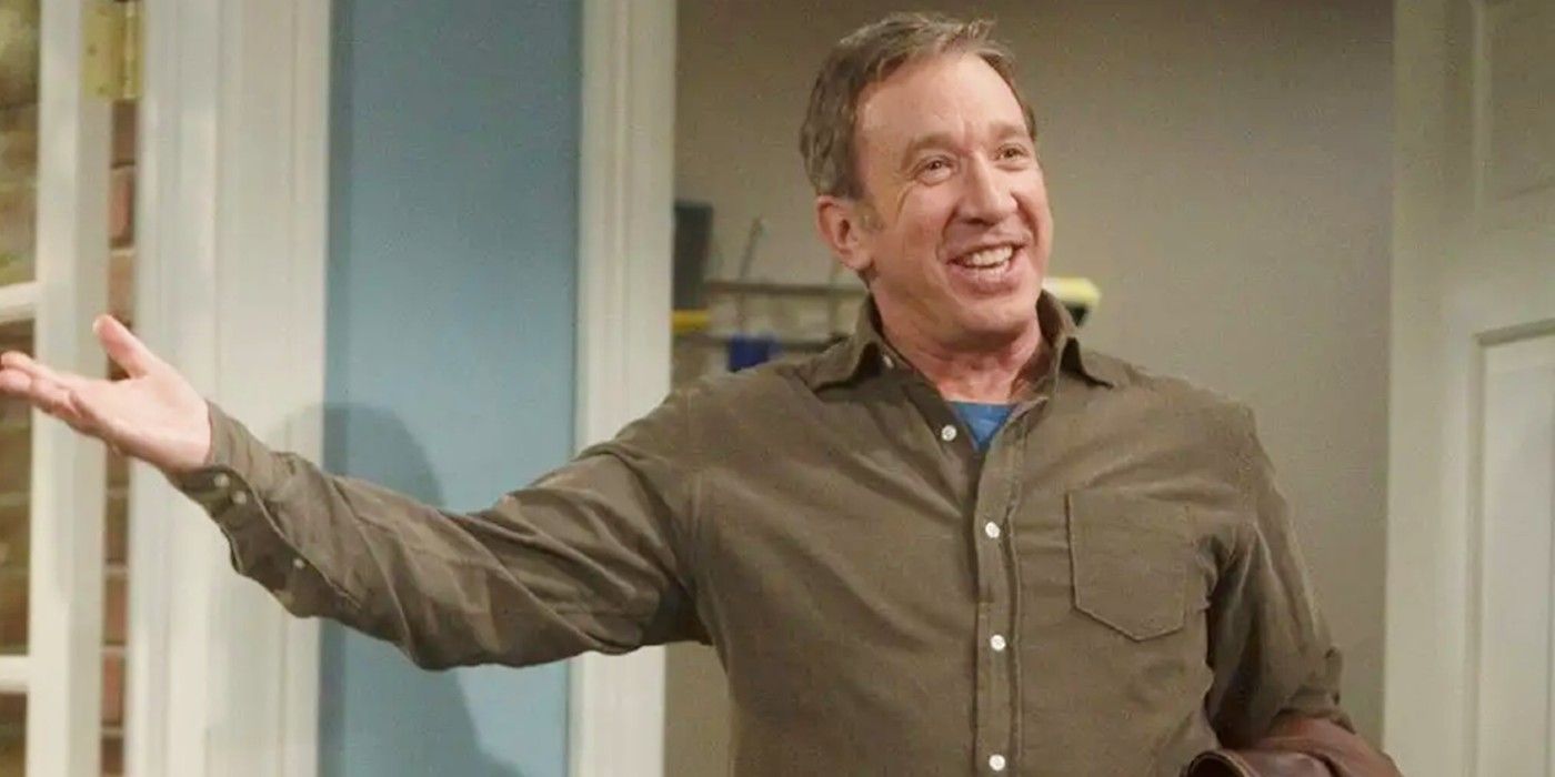 Tim Allen holding his arm out with a smile in Last Man Standing